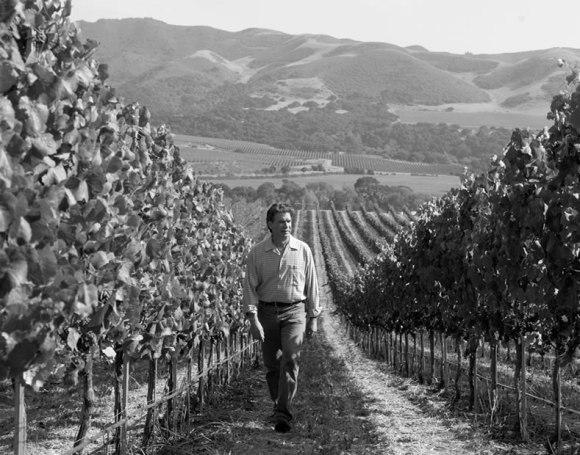 Rick Longoria walking his vineyard